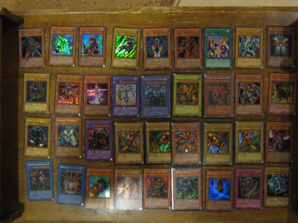 5500+ yugioh cards !!! All trades and cash look !!! Lots of Holo's