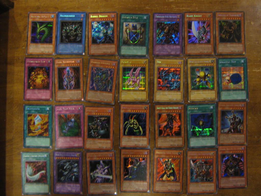 5500+ yugioh cards !!! All trades and cash look !!! Lots of Holo's